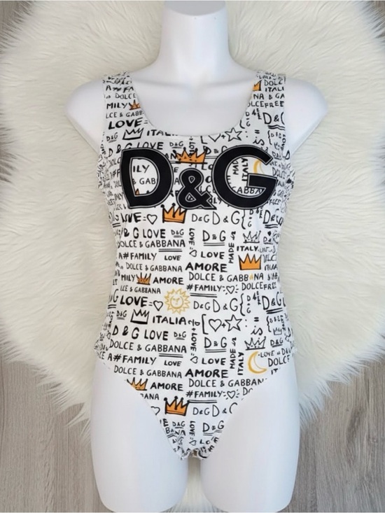 D&G Tops - D&G White One-Piece Black Script and Yellow Accents